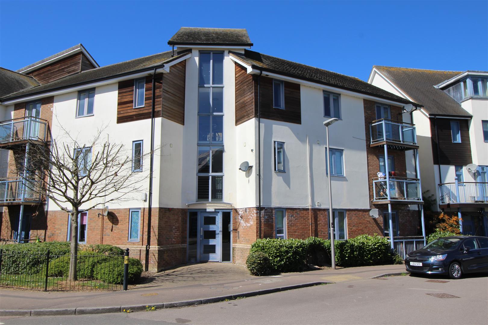 EXCELLENT LOCATION OVERLOOKING OPEN GRASS LAND AND THE BROUGHTON BROOK TO THE FRONT whilst only a short walk from the local centre. Newly decorated and re-carpeted 2 bedroom top floor apartment with a balcony from the lounge overlooking the park land and